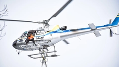 ledningsbesktning med helikopter